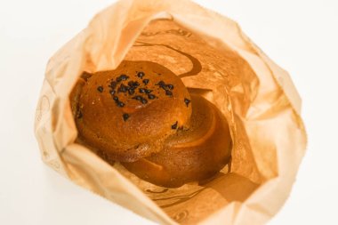 Çikolatalı için yemek paket servisi olan restoran torbaya ile pişmiş topuz kapatın