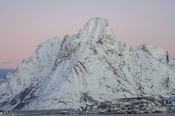 close up mountain in Reine, Norway full of snow in winter with morning light