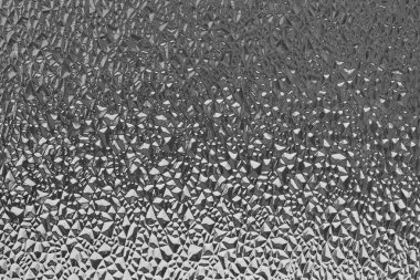 Siyah ve nervürlü cam yüzeyli. Soyut arka plan. 