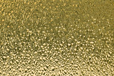 Sarı nervürlü cam yüzey. Soyut arka plan. 