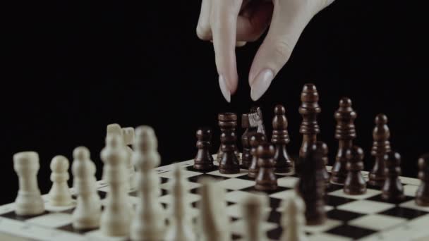 Chess game on black background close up — Stock Video