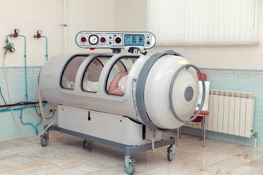 A pressure chamber is a device that saturates the body with a significant amount of oxygen. Hyperbaric oxygenation. clipart