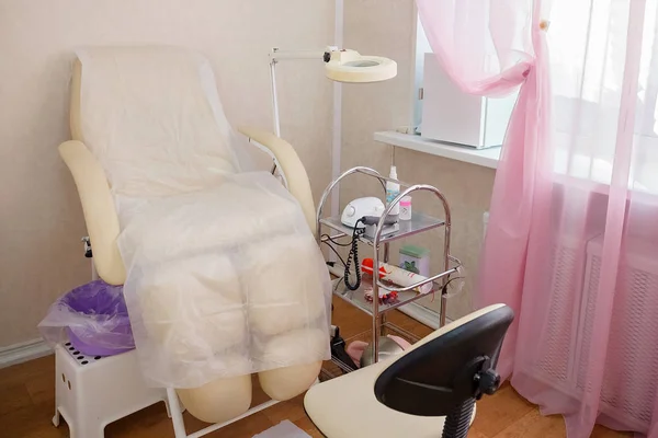 Pedicure room. Prevention of ingrown nail. Health and beauty. Job. A chair for a pedicure.