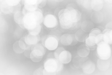 Gri ve beyaz ufuk doğa bulanık bulanıklık veya kar parlaklık renkli ışık ışık hayatta bahar arka plan ile bir ağacın altında pırıl pırıl bokeh daireler renk.