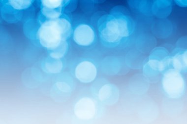 Mavi ve beyaz ufuk doğa bulanık bulanıklık veya kar parlaklık renkli ışık ışık hayatta bahar arka plan ile bir ağacın altında pırıl pırıl bokeh daireler renk.