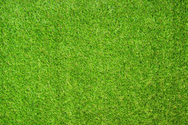 Güzel yeşil suni çim arka plan vignette veya doğal olarak duvarları Ideal tasarım kullanmak için oldukça doku. doğal desen doku taze bahar golf sahası ya da futbol sahası.