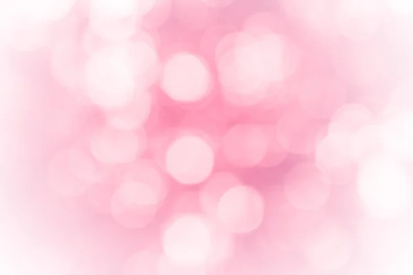 粉红色和白色模糊模糊的模糊的偏离或波克圆圈颜色雪光五颜六色的光闪闪发光下的树木与光幸存春天的抽象背景 — 图库照片