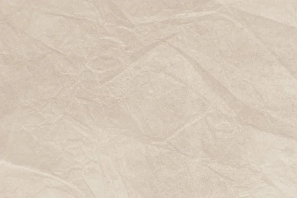 Natural recycled paper or paperwork closeup of wrinkle texture shiny work sheet. Have art light tone brown adorn.