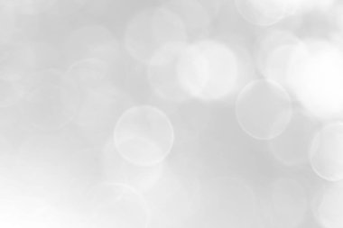 Soyut Beyaz Bokeh yumuşak arka plan bulanık doğa bulanık ışıkla parıldayan vintage tarzı sıcak pastel parti ve serin renkli ufuk daire soluk. Tatil kartı için parlak kopya alanı. 