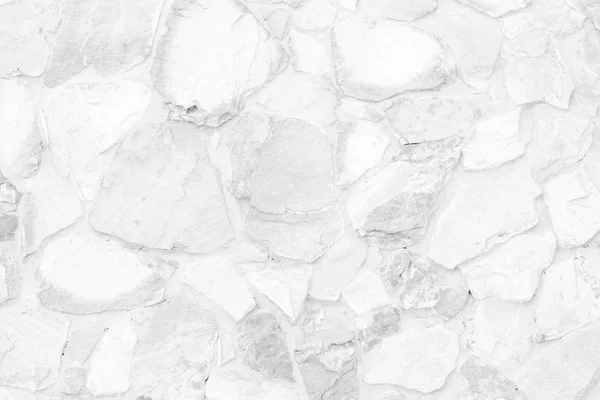 Seamless White stone wall pattern of decorative gray slate surface of modern style design decorative uneven cracked realmasonry wall of multicolored stones or blocks with cement or sandstone.