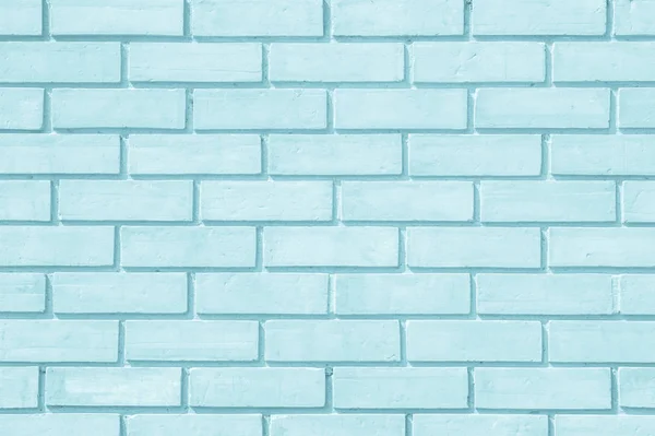 Mur z cegły malowane z blado niebieska farba pastel ton spokojny tekstura tło. Cegły i kamienia posadzki wnętrza rock stary wzór czyszczenia betonu siatki nierówna cegły projekt stosu. — Zdjęcie stockowe