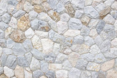Tuğla taş duvar yığını ortaçağ doğal taş dokusu arka plan veya kaya katmanı dikişsiz soyut kaya ve gri yontulmuş bir duvarın parçası antik.