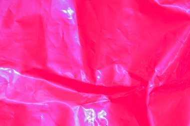 Duvar yüzeyinin plastik dokusu. Pembe ile soyut arkaplan.