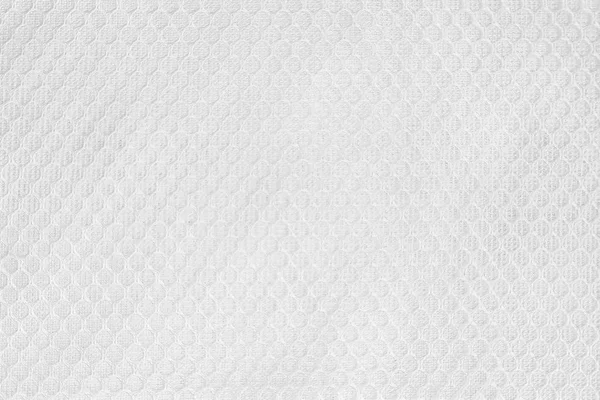 Weiße abstrakte Baumwolltuch-Mock-up-Schablonenstoff auf dem Hintergrund. Stofftapete mit künstlerischer Textur aus grauem Leinen. Stoffdecke oder Vorhang mit Muster und Kopierraum für Textdekoration. — Stockfoto