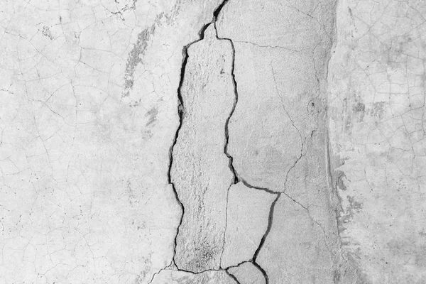 Grunge parede de concreto em coberto com cimento cinza superfície antiga com rachadura no edifício industrial, ótimo para o seu design e textura de fundo. Preto e branco rachado conceito vintage textura chão . — Fotografia de Stock