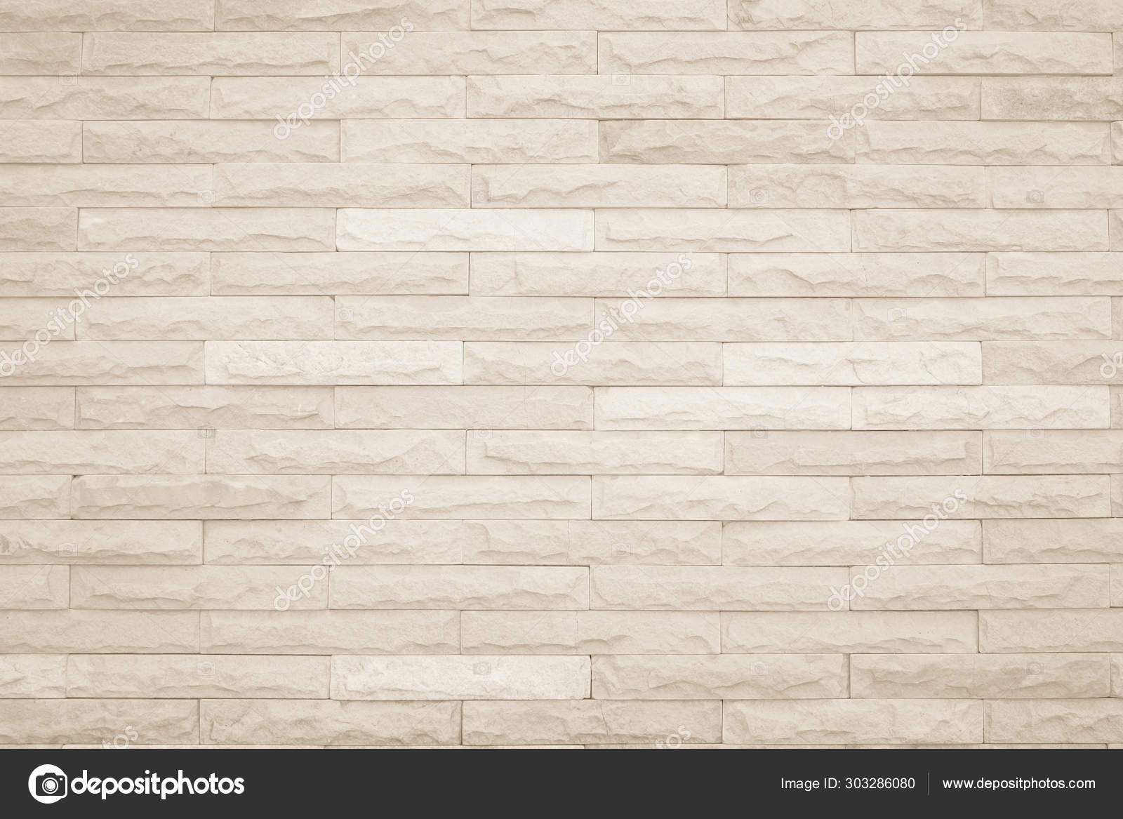 Wall cream brick wall texture background in room at subway. Brickwork stonework interior, rock