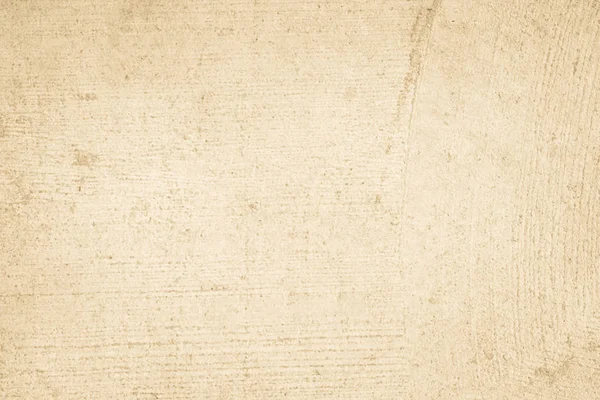 Cream concreted wall texture background.