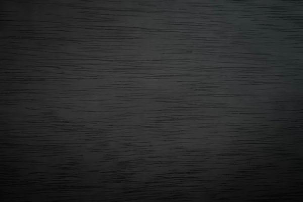 Abstract vignette black wood texture high quality close up. Dark furniture plank material wallpaper. Blank grunge wooden grain surface be used design as background or board luxury floor copy space. - Stock Abstract vignette black wood texture high quality close up. Dark furniture plank material wallpaper. Blank grunge wooden grain surface be used design as background or board luxury floor copy space. - Stock