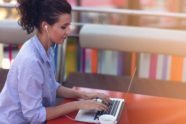 Mixed race female performing business negotiations on video chat. Telecommuting concept.