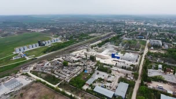 Aerial view from the air to an abandoned factory. Abandoned building exterior. — Stock Video