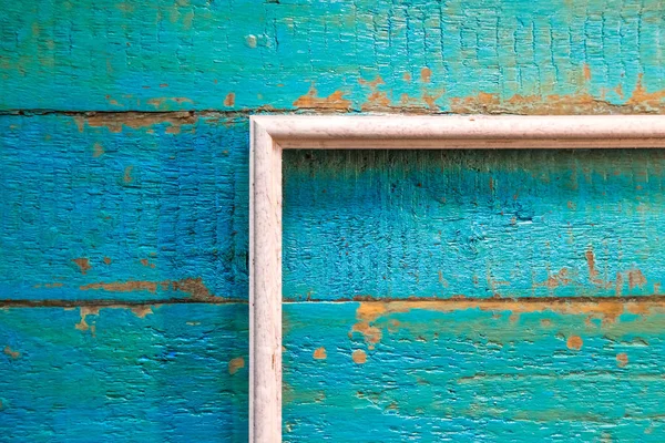 Fotoğraf ve resim mavi dokulu ahşap arka plan üzerinde beyaz renk için boş bir çerçeve