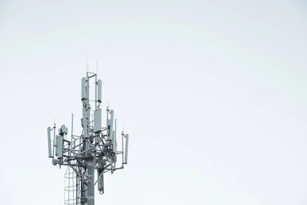 tower with antennas of cellular mobile communication in the city