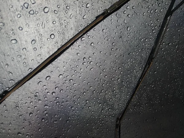 Raindrops on umbrella fabric — Stock Photo, Image