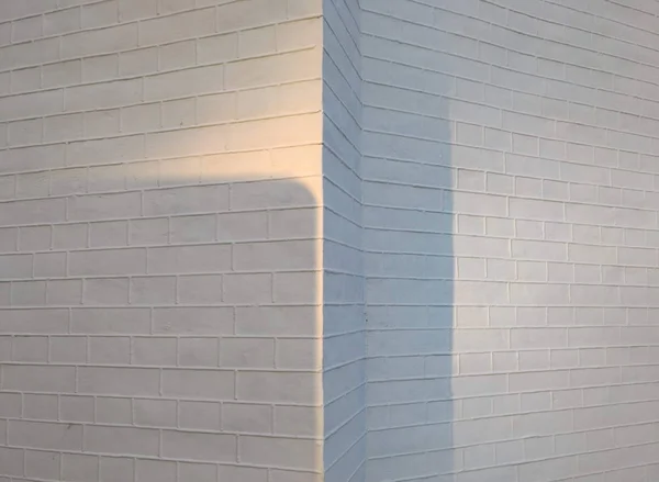 La texture d'un mur de briques avec des ombres — Photo