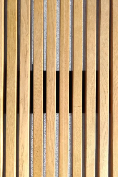 Texture of lacquered wood on a bench