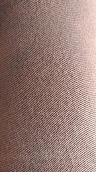 The texture of the fabric surface of the trousers