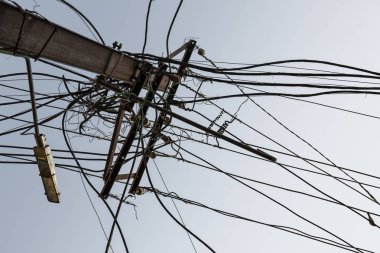 Ancient electric wires on a street of New Dehli, India