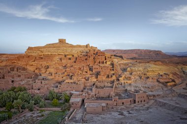 Morocco - Draa-Tafilalet - Ancient fortress (ksar) Ait Benhaddou between desert and mountains, UNESCO world heritage site clipart