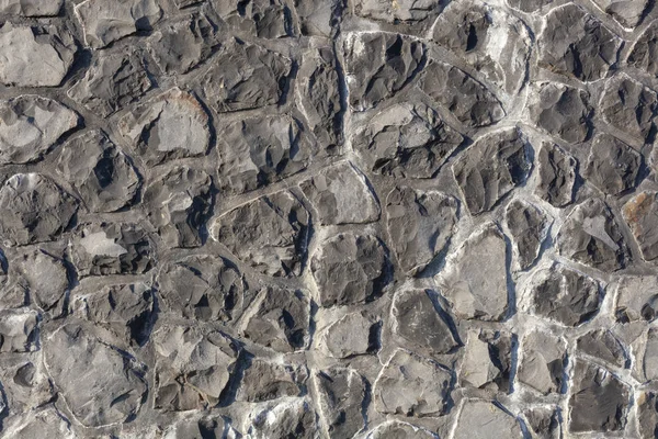 Сірий візерунок декоративної коричнево-сірої сланцевої поверхні кам'яної стіни — стокове фото