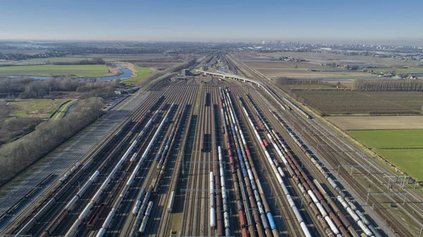 Cargo trains. Aerial view of colorful freight trains. Railway st