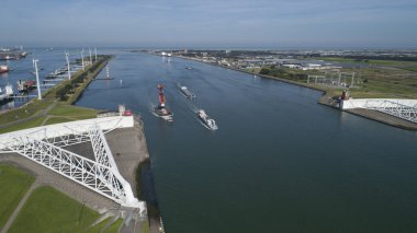 Aerial picture of Maeslantkering storm surge barrier on the Nieuwe Waterweg Netherlands clipart