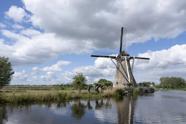 stock image Traditional setting of the historical dutch windmills landscape at the Netherlands, an UNESCO world heritage site in holland