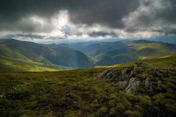 Rain clouds above Carpathians. Panorama of Borzhava ridge of the Ukrainian Carpathian Mountains