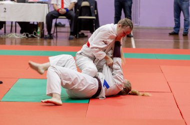Rusya, Vladivostok, 11/03/2018. Jiu-Jitsu güreş rekabet kadınlar arasında. Dövüş sanatları ve dövüş sporları turnuva.