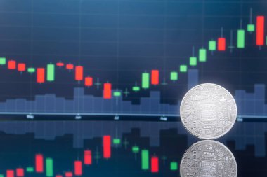 (ICO) sunan ilk madeni para ve dijital para kavramı - yatırım fiziksel metal dijital paralar ile arka planda mavi küresel ticaret Döviz piyasa fiyatı grafiği.