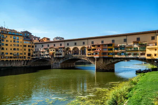 Florence Ponte Vecchio Bridge and City Skyline in Italy. Florence is capital city of the Tuscany region of central Italy. Florence was center of Italy medieval trade and wealthiest cities of past era.