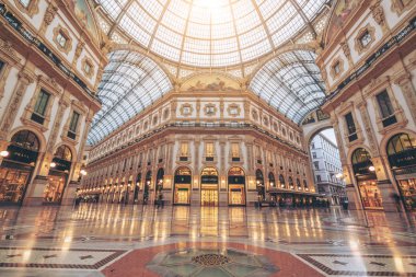 Milan, Italy - Sep 29, 2017: Galleria Vittorio Emanuele II in Milan, Italy is the oldest shopping mall of Milan. Galleria Vittorio Emanuele II was named after Victor Emmanuel II, first king of Italy. clipart
