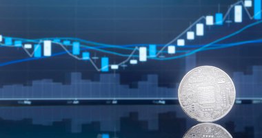 (ICO) sunan ilk madeni para ve dijital para kavramı - yatırım fiziksel metal dijital paralar ile arka planda mavi küresel ticaret Döviz piyasa fiyatı grafiği.