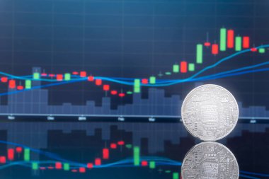 (ICO) sunan ilk madeni para ve dijital para kavramı - yatırım fiziksel metal dijital paralar ile arka planda mavi küresel ticaret Döviz piyasa fiyatı grafiği.