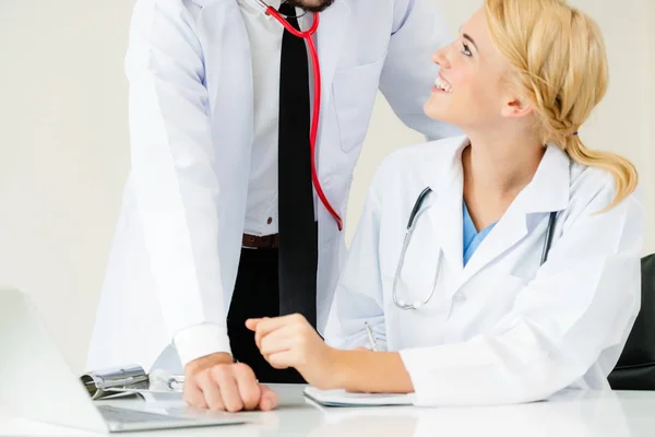 Doctor Hospital Office Writes Notes Patients Report While Having Conversation — Stock Photo, Image