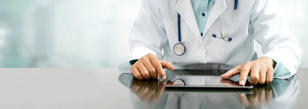 Male Doctor Sitting Table Tablet Computer Hospital Office Medical Healthcare — Stock Photo, Image