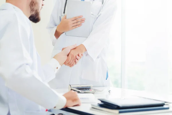 Doctor Hospital Giving Handshake Another Doctor Showing Success Teamwork Professional — Stock Photo, Image