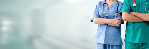Two Hospital Staffs Surgeon Doctor Nurse Standing Arms Crossed Hospital Stock Picture