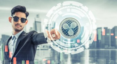 Dalgalanma ve kavram - dalgalanma (Xrp) işaret eden işadamı modern işletme Binası ve cityscape arka plan ile yatırım cryptocurrency. Blockchain teknoloji.