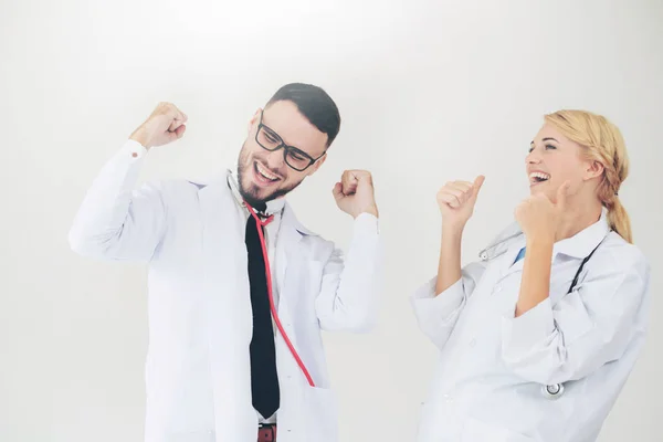 Happy Successful Doctor Celebrates Victory Hospital Office Another Doctor Standing — Stock Photo, Image