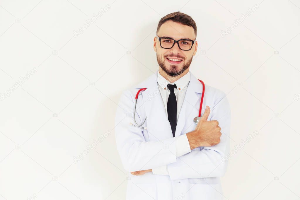 Doctor showing thumbs up while on white background. Medical and healthcare concept.